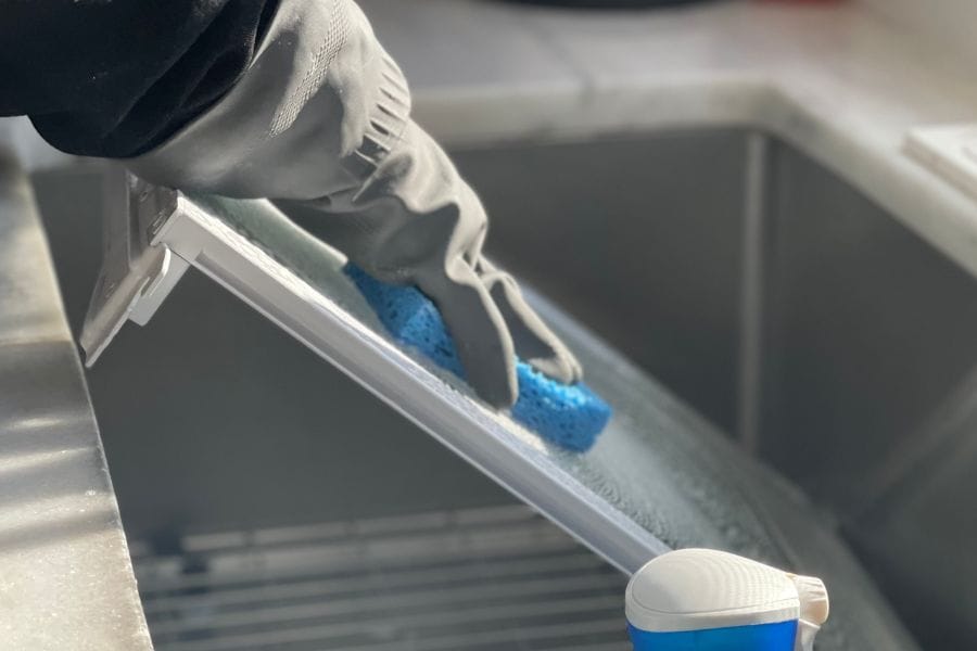 Washing of refrigerator shelf