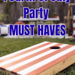 A cornhole board on grass.