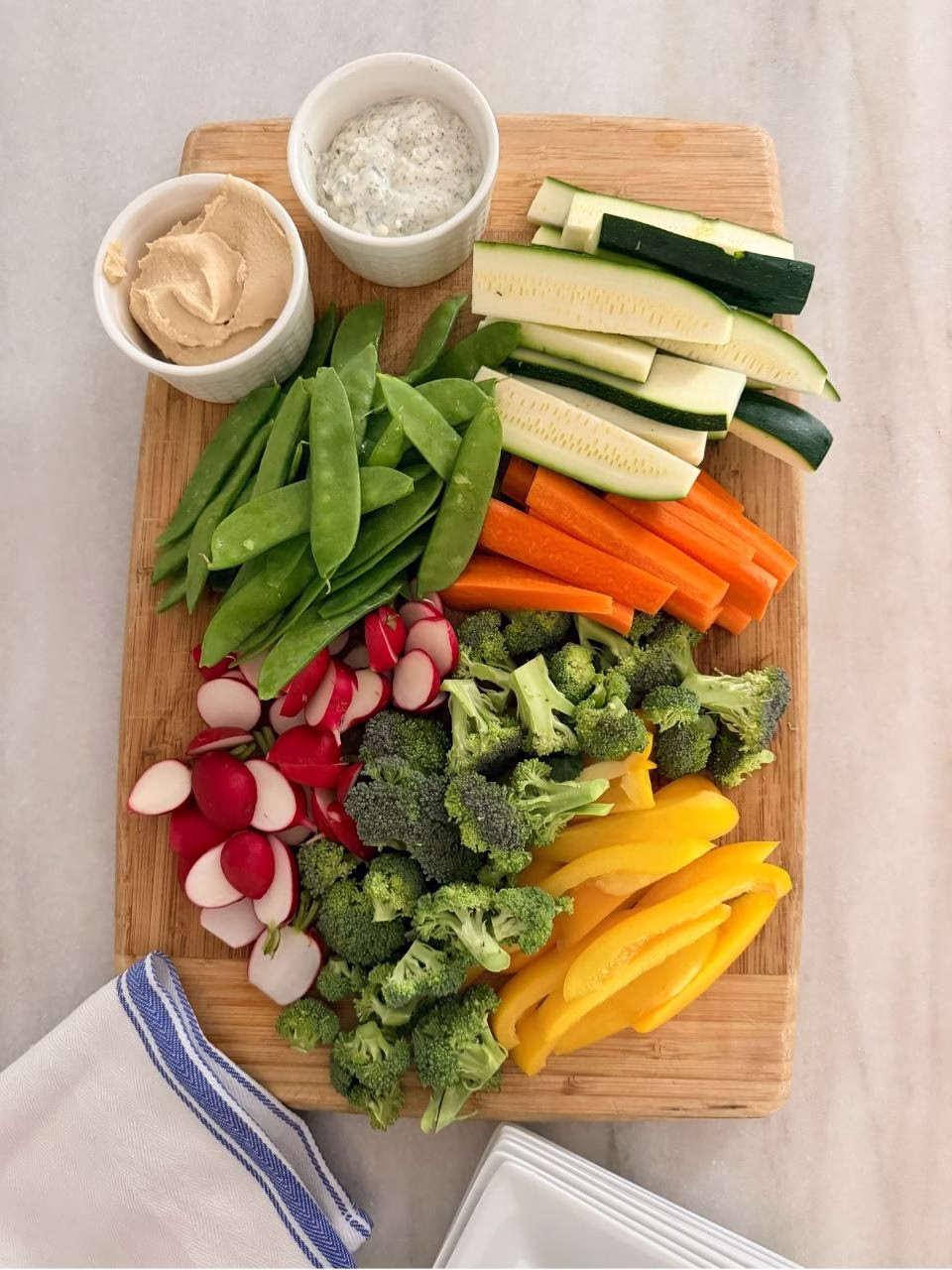 fresh cut vegetables on a wood board