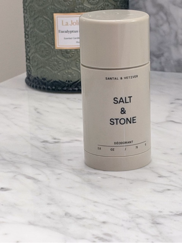 Salt & Stone santal & vetiver deodorant on a countertop